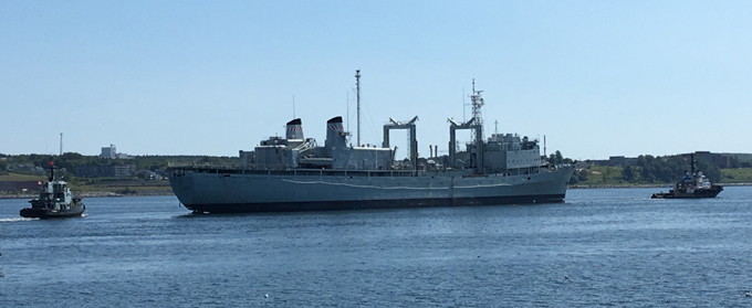 The HMCS Preserver is towed to the Sydport Industrial Park in Sydney Nova Scotia by Marine Recycling Corporation.